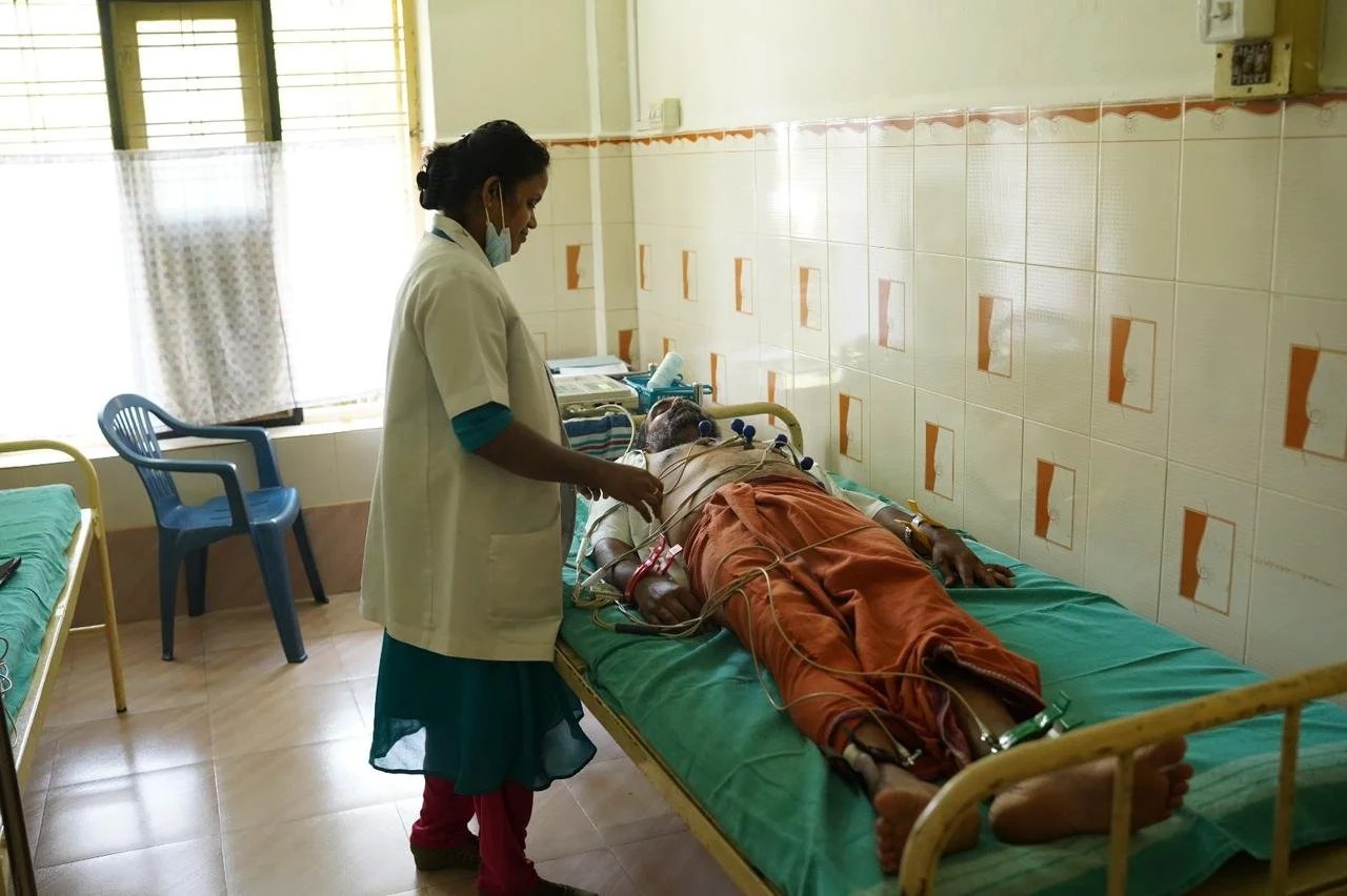 A nurse attends to a patient at a free FutureBright health camp
