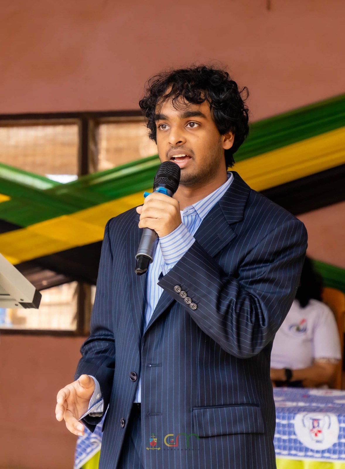 Nathan Francis addressing the community on the microphone